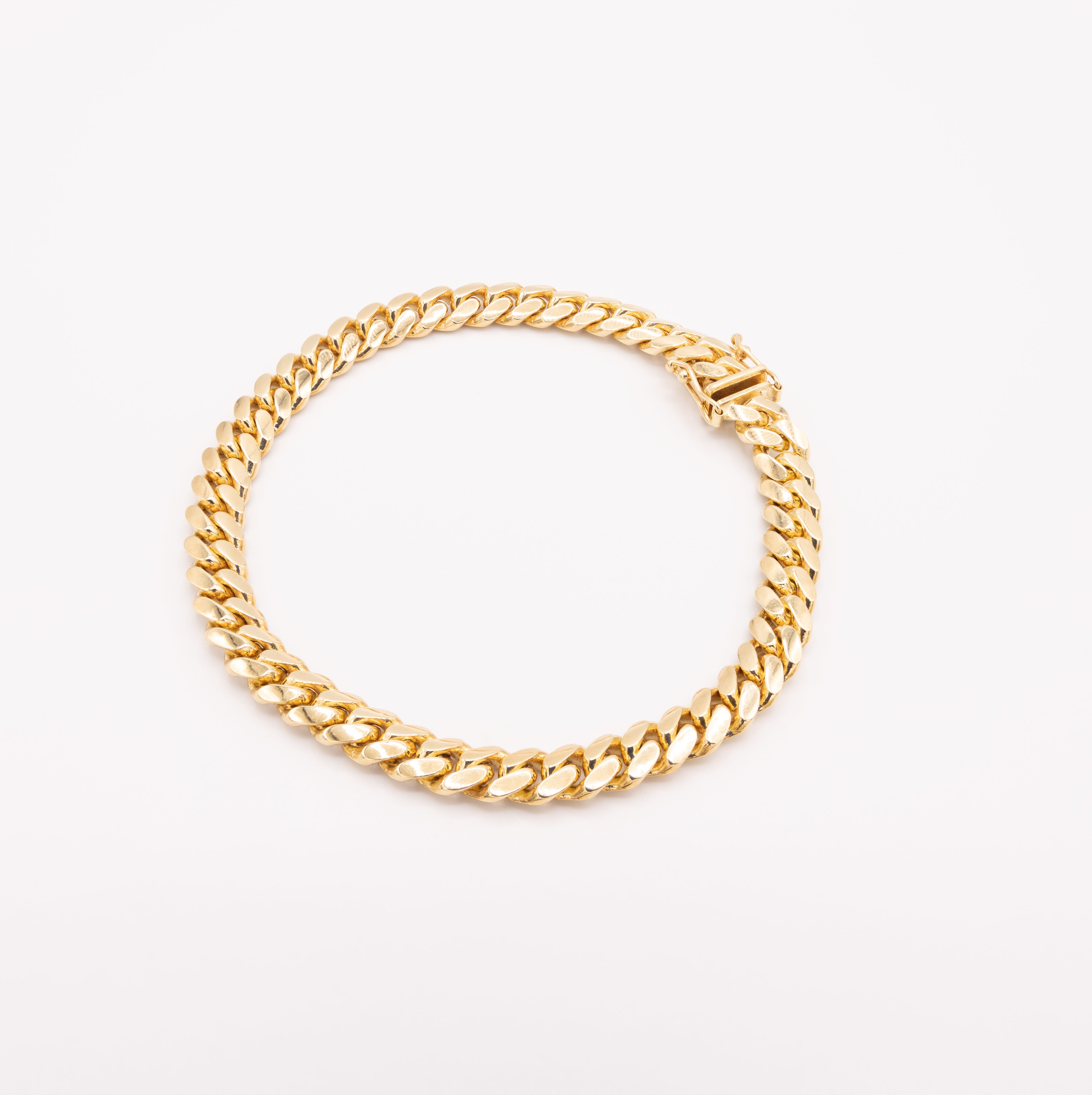 Solid Gold Miami Cuban Bracelet 7mm fine designer jewelry for men and women